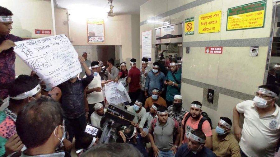 Migrant workers fasting unto death for RT-PCR lab at Dhaka airport