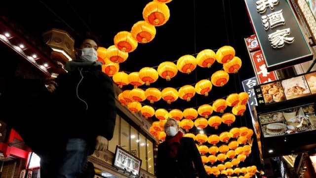 Japan to expand COVID curbs
