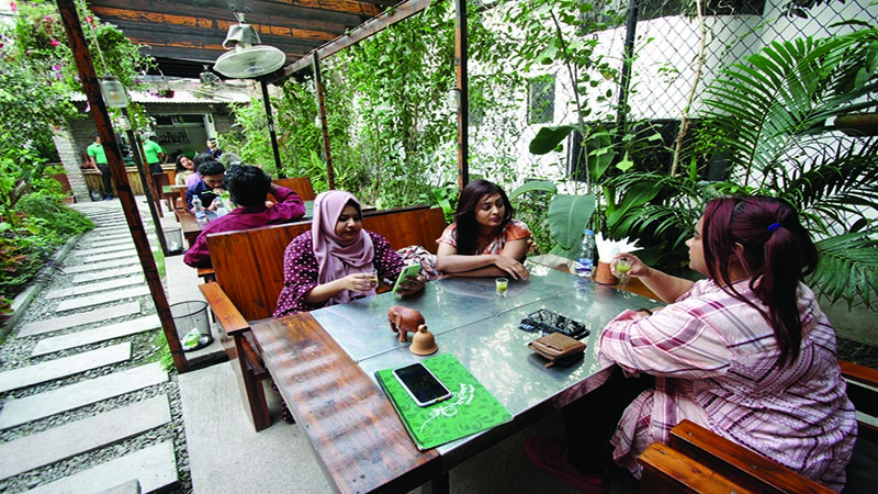 Forget city bustle, enjoy satisfying tea at beautiful rooftop garden
