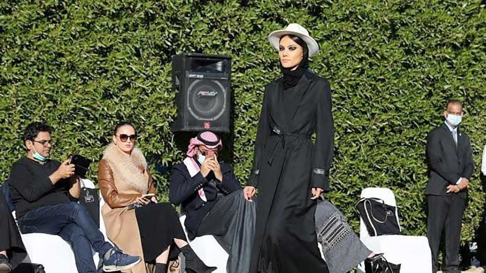 Chic Abayas on the Catwalk in rare Saudi fashion show