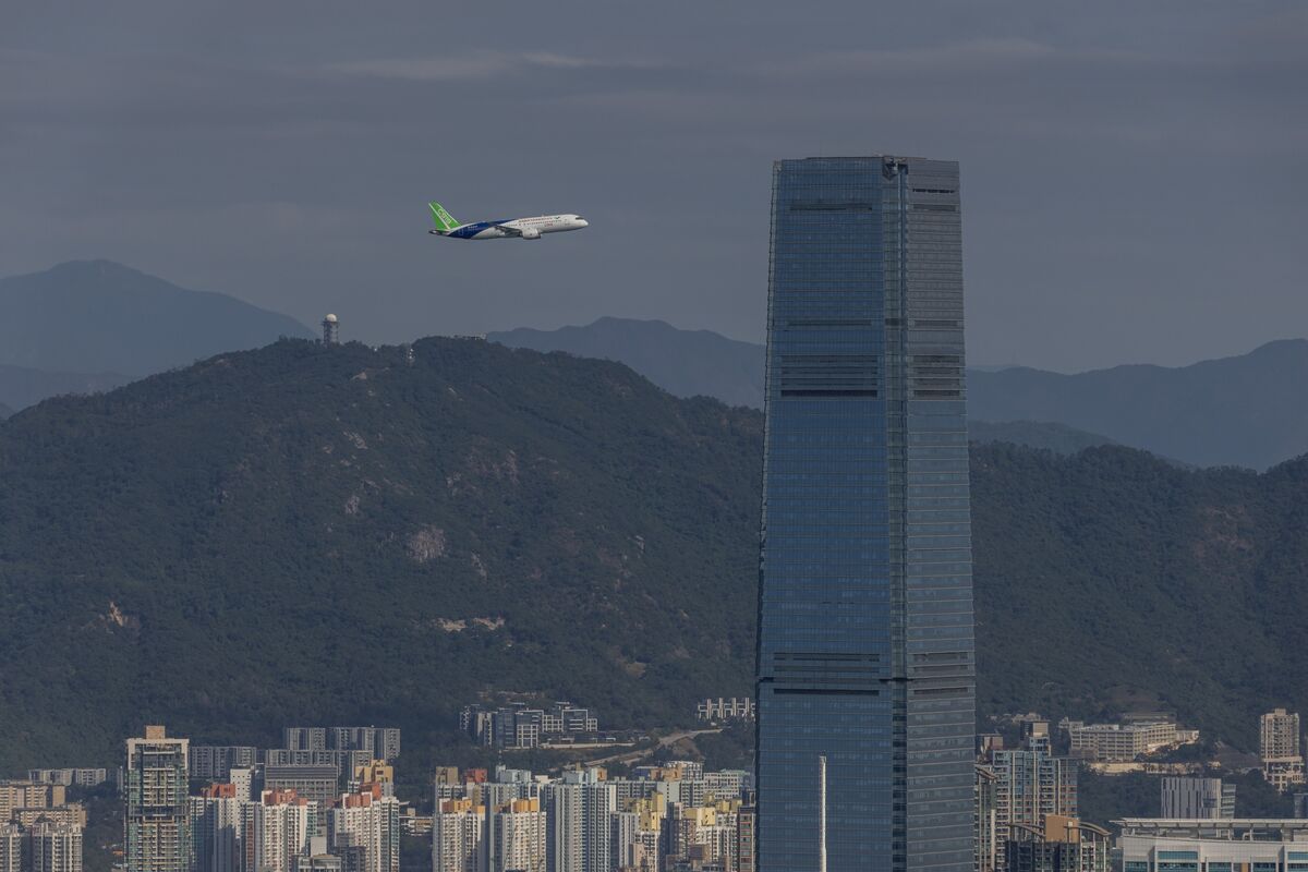 China's C919 passenger jet takes flight over Hong Kong