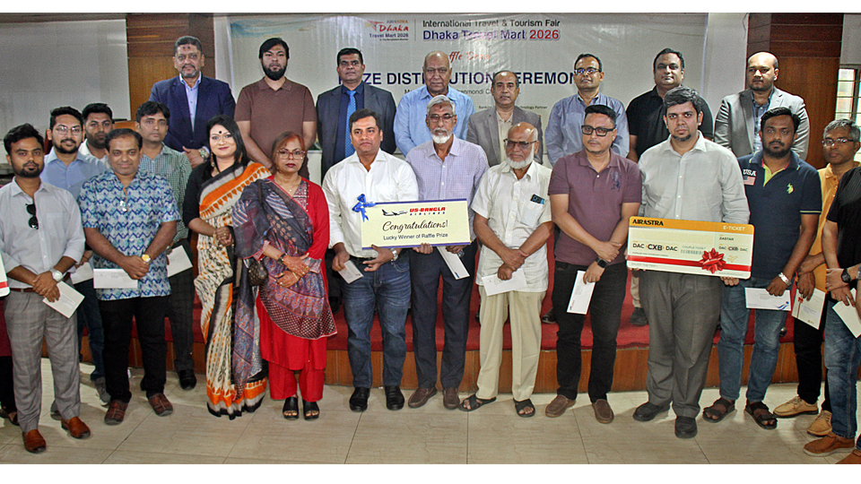 Winners of Dhaka Travel Mart 2026 raffle draw receive prizes