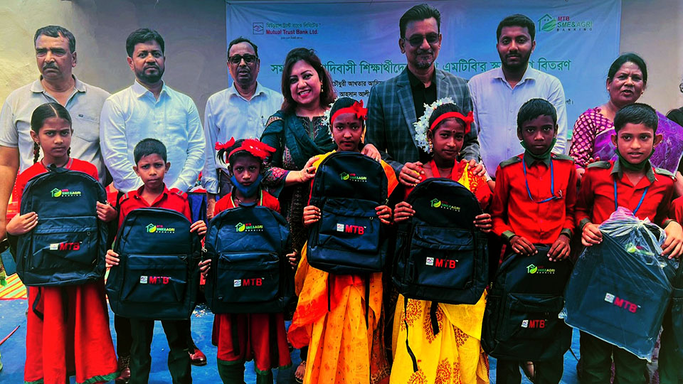 MTB distributes school bags to students in Naogaon