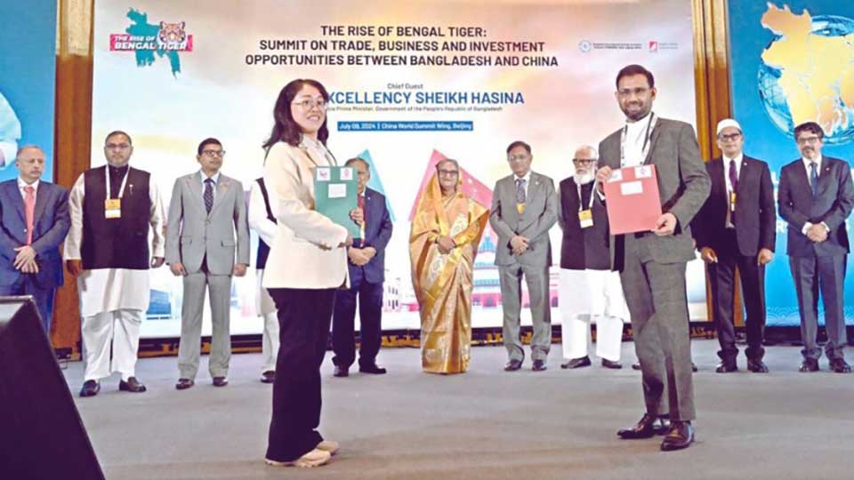 Dhaka, Beijing ink 16 MoUs