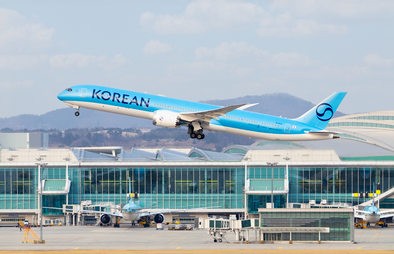 Korean air plans to merge mileage plan with Asiana