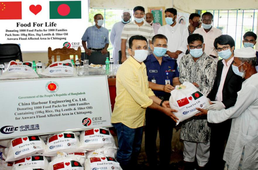 China Harbour distributes foodstuff among flood victims