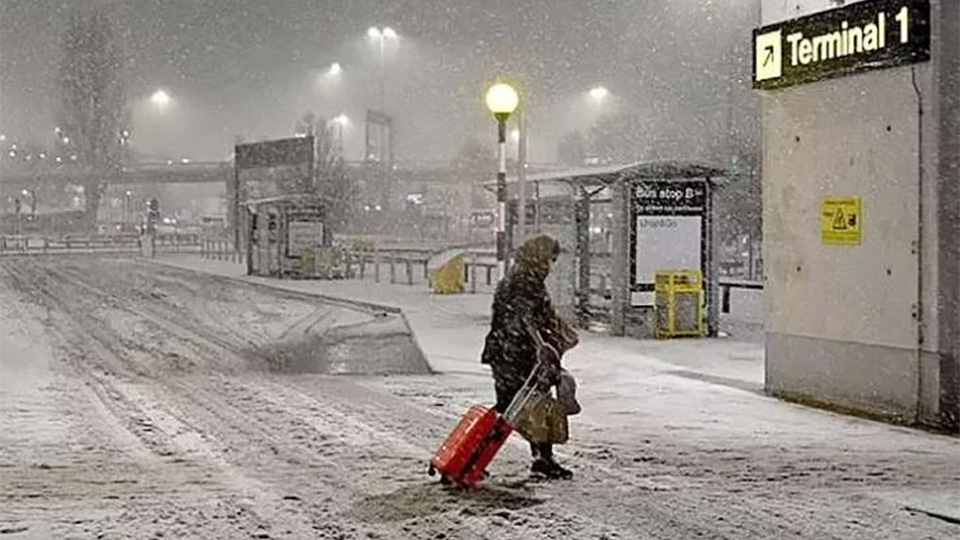 Snowstorm causes mass flight cancellations across UK